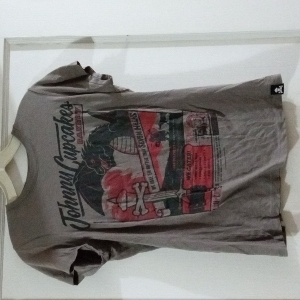 Johnny Cupcakes size small tan short sleeve shirt
